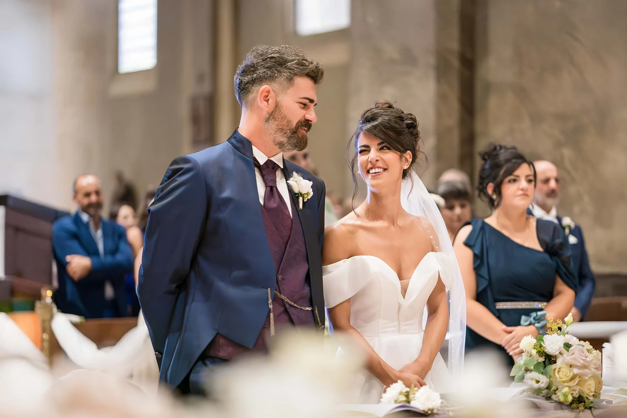 Home Page Simone Goglia 11 Smiling bride and groom at the altar during the church ceremony